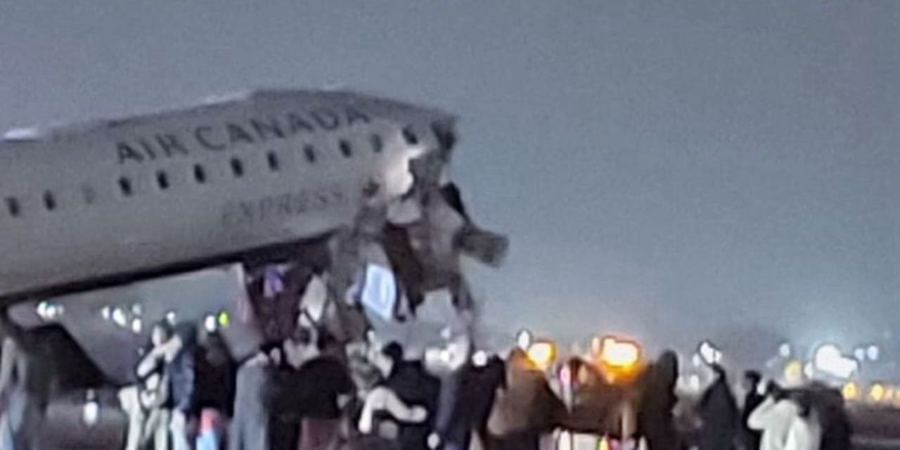 Air Canada Express jet hits vehicle at LaGuardia, four injured, airport closed