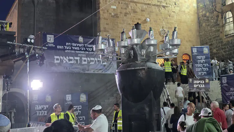 Watch live: Ancient and new meet as thousands visit Rabbi Meir’s grave