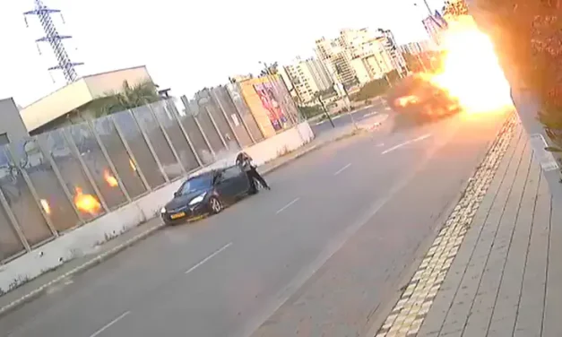 Watch: Woman stands up and walks away after being hurt by missile