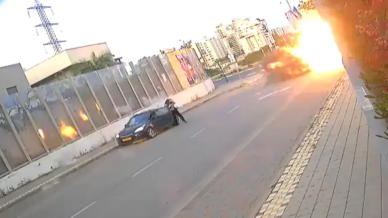 Watch: Woman stands up and walks away after being hurt by missile