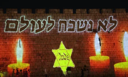 Jerusalem remembers: Yellow star, ‘We will never forget’ projected on Old City walls