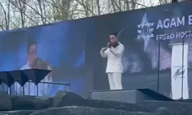 Former hostage Agam Berger performs solo violin piece at March of the Living