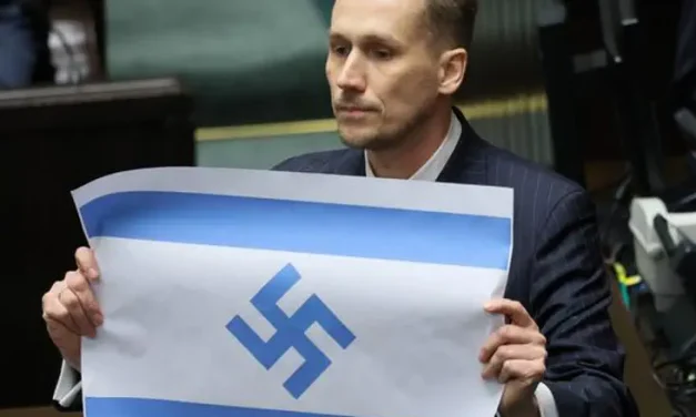 On Holocaust Remembrance Day: Polish MP displays Israeli flag with a swastika
