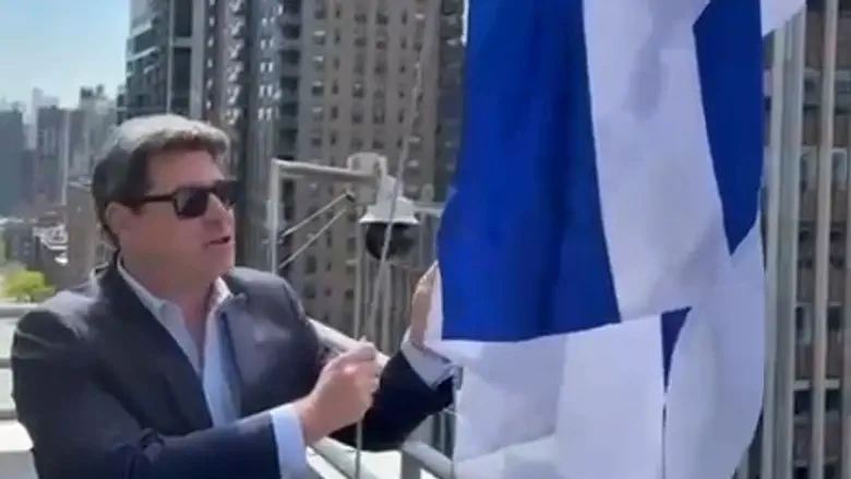 Watch: Ofir Akunis waves Israeli flag in New York