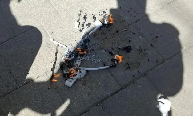 Police arrest man suspected of burning flag