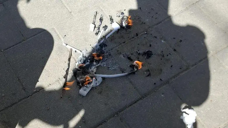 Police arrest man suspected of burning flag