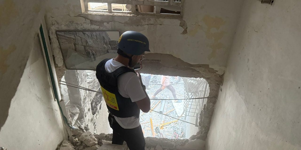 Sixteen wounded in central Israel after Iran launches cluster munitions