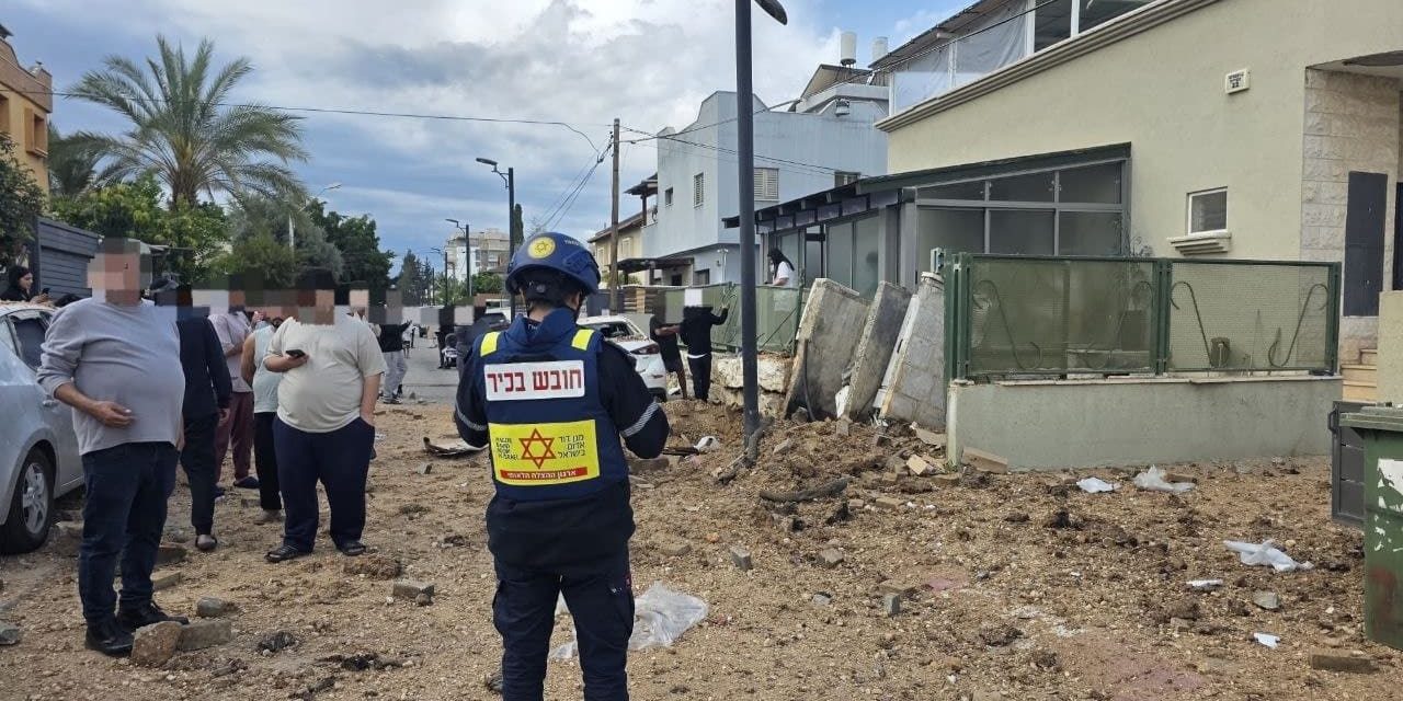 Iranian missile fragments hit several locations in central Israel following interception