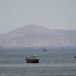 Iran uses fast boats to seize container ships in Strait of Hormuz, challenging US blockade