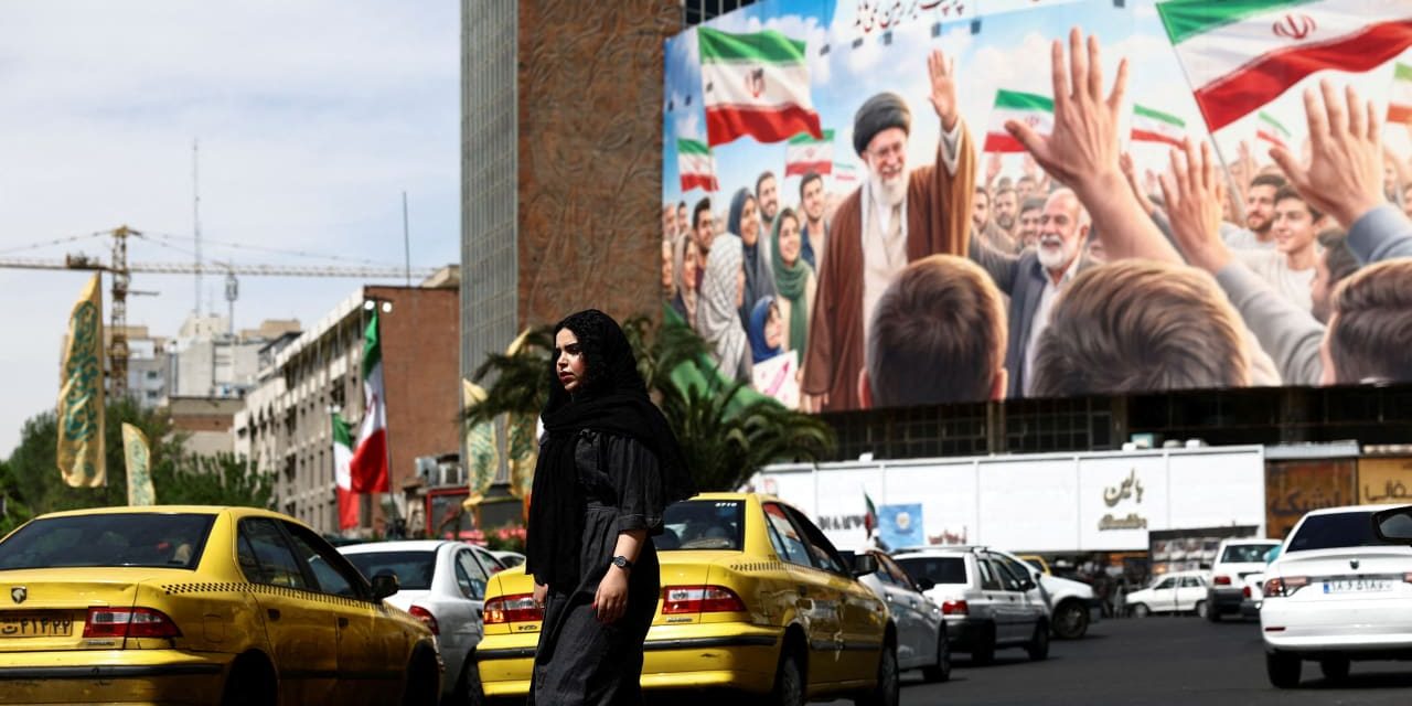 Behind Tehran’s calm, Iran faces deepening economic collapse