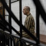 Assad brothers summoned in absentia as Syria opens landmark trial of former security chief