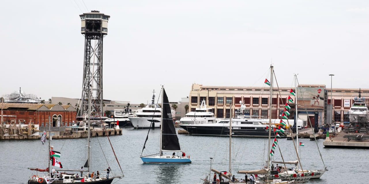 Gaza-bound Global Sumud Flotilla approached by warships, activists claim