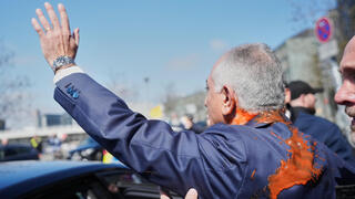 Exiled Iranian crown prince splashed with red paint in Berlin | Watch