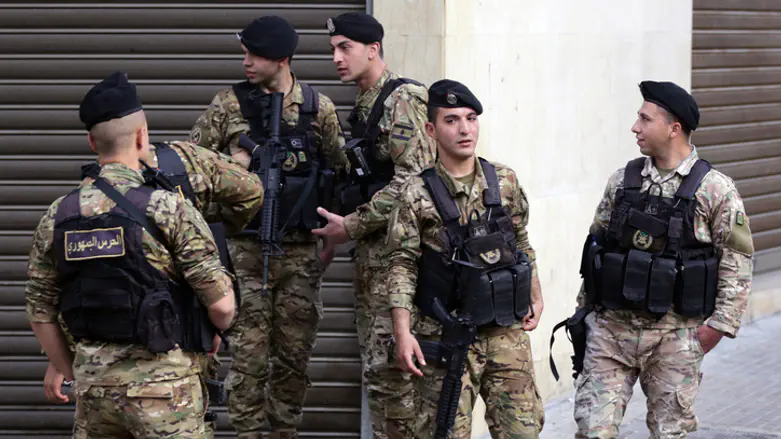 Lebanese troops deployed to Hezbollah Beirut stronghold following heavy weapon fire