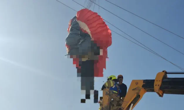 Paraglider injured after hitting power lines