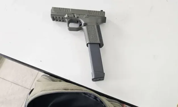 Student arrested with handgun in backpack