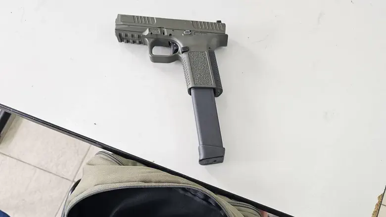 Student arrested with handgun in backpack