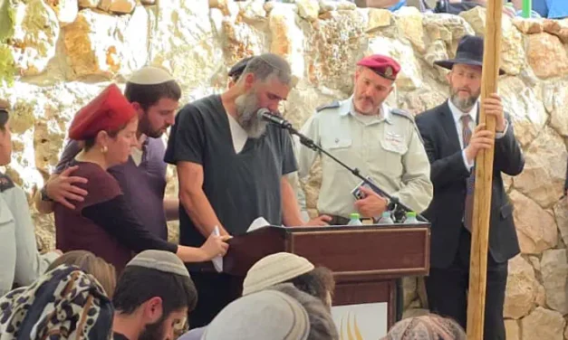 Bereaved father sings haunting song about sacrifice over son’s grave