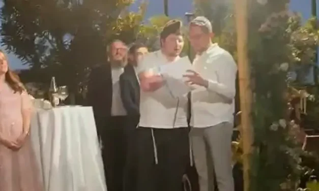 Seriously injured soldier says blessing at friend’s wedding