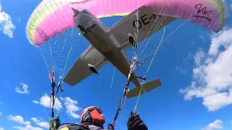 Mid-air panic: Light aircraft collides with paraglider