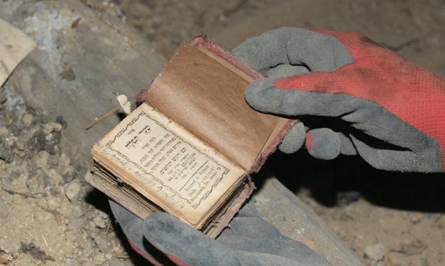 Star of David band, siddur found under attic floorboards in building from Bedzin’s Jewish Ghetto