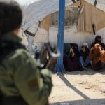 Australian woman charged with joining Islamic State after returning from Syrian refugee camp