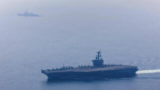 US carrier fires on Iranian-flagged tanker attempting to breach blockade