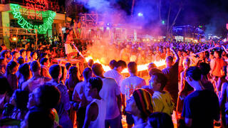 Thailand’s Full Moon party spirit comes to Tel Aviv’s Frishman Beach