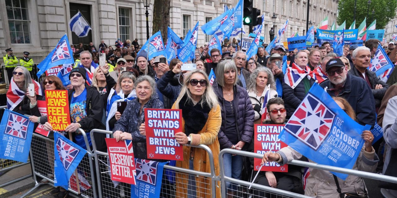 Labour politician is booed as thousands rally against antisemitism in London