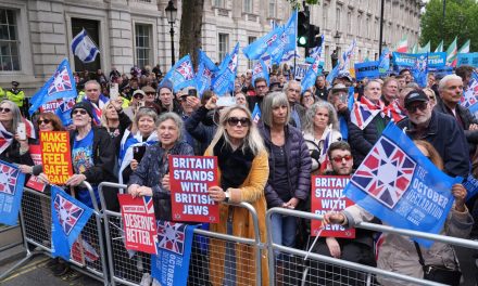 Labour politician is booed as thousands rally against antisemitism in London