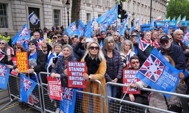 Labour politician is booed as thousands rally against antisemitism in London