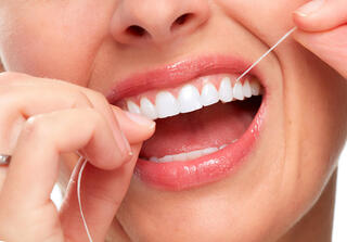 Why dental floss may not be enough to prevent gum disease, experts say