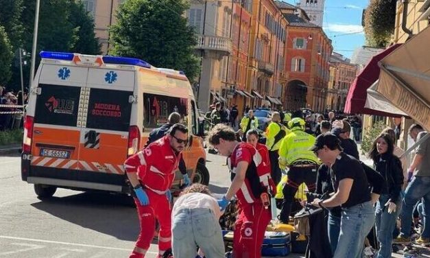 Driver hits 7 pedestrians in northern Italy, crashes into shop and stabs bystander