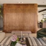The safe room was stuck in this 1980s home; the redesign turned it into its boldest feature