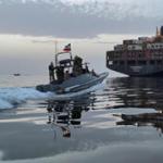 Iran claims missiles hit US warship near Hormuz after warning ignored