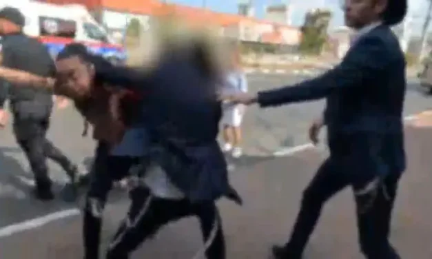 Watch: Haredi rioter assaults female detective and attempts to flee