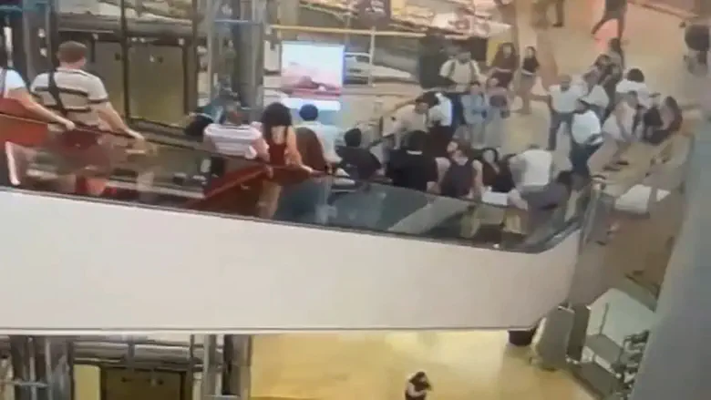Watch: Police chase suspect through crowded mall