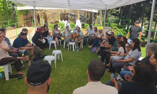 Tearful farewell at grave of fallen soldier