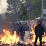 Anti-immigration riots erupt in Belfast after police arrest Sudanese stabbing suspect