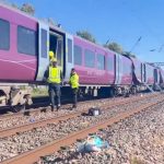 One killed and dozens injured in train collision north of London, police say