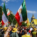 Paris police arrest 20 as demonstrators defy ban on Iran opposition rally