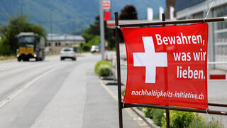 A vote about immigration limits: Swiss voters face referendum on capping population at 10 million
