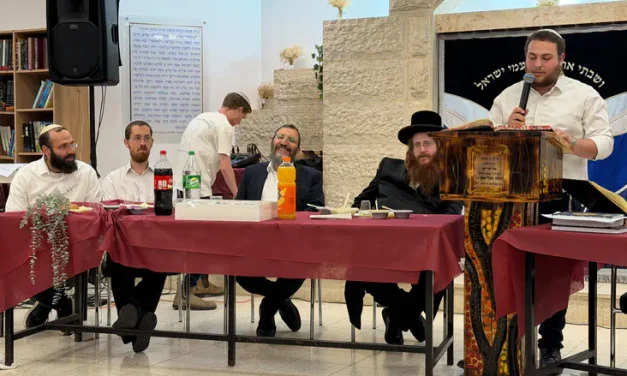 12th-grade student at Shvut Yisrael completes the Shas