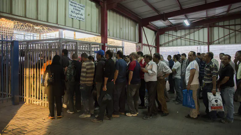 Four days after attack: Palestinian Arab workers returning to Judea and Samaria
