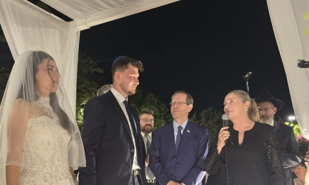 Herzog attends wedding of former Gaza hostages Sapir Cohen, Sasha Troufanov
