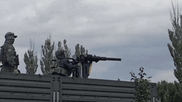 Watch: Russian soldier fires helicopter cannon, loses control and flies through the air