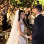 Former hostages Sasha Troufanov and Sapir Cohen marry in emotional ceremony | Watch