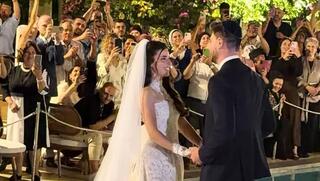 Former hostages Sasha Troufanov and Sapir Cohen marry in emotional ceremony | Watch