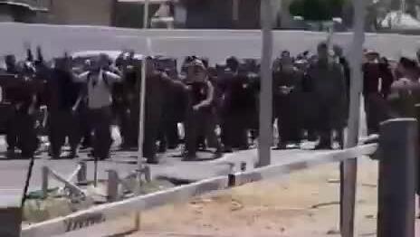 ‘They can suck it’: dozens of soldiers walk out of base in protest against commanders | Watch