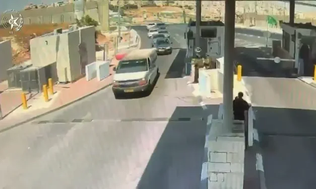 Vehicle breaks through checkpoint, runs over spike strip, & crashes into car